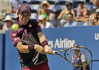 The Latest: Nishikori into quarterfinals in US Open return