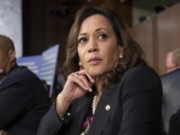 Senate Supreme Court Kamala Harris, Cory Booker Sen. Kamala Harris, D Calif., and Sen. Cory Booker, D N.J., left, pause as protesters disrupt the confirmation hearing of President Donald Trump's Supreme Court nominee, Brett Kavanaugh, on Capitol Hill in Washington, Tuesday, Sept. 4, 2018. (AP Photo/J. Scott Applewhite) Kamala Harris, Cory Booker