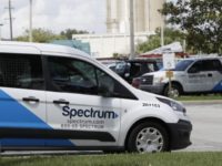 Charter Spectrum Wireless Service This Tuesday, Sept. 4, 2018, photo shows Charter Communications, Inc.'s Spectrum trucks in the parking lot at a Spectrum customer center in Orlando, Fla. Cable company Charter is launching a $45 a month unlimited data phone plan as cable companies try to diversify to offset slowing traditional cable TV revenue. (AP Photo/John Raoux) The Associated Press