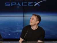 SpaceX Moon In this Feb. 6, 2018 file photo, Elon Musk, founder, CEO, and lead designer of SpaceX, speaks at a news conference after the Falcon 9 SpaceX heavy rocket launched successfully from the Kennedy Space Center in Cape Canaveral, Fla. SpaceX says it’s signed the first private moon traveler. The big reveal on who it is and when the flight to the moon will be is scheduled for Monday, Sept. 17, 2018. (AP Photo/John Raoux) SpaceX changes plans to send tourists around the moon