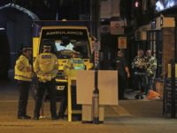Britain Poisoned Spy Emergency services personnel stage outside Prezzo restaurant, Sunday, Sept. 16, 2018, in Salisbury, United Kingdom, where police have closed streets as a "precautionary measure" after two people were taken ill from the restaurant, amid heightened tensions after the Novichok poisonings earlier in the year. (Jonathan Brady/PA via AP) Roads shut after 2 fall ill in UK city where ex-spy poisoned