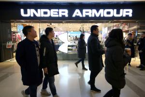 Nike, Under Armour shares climb