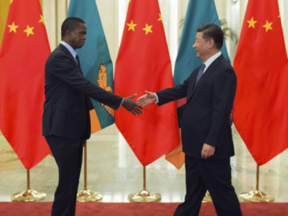 Zambia’s President Edgar Lungu, left, shakes hands with China’s President Xi Jinping, prior to their bilateral meeting at the Great Hall of the People, in Beijing, China, Sept. 1, 2018. Some are expressing concerns that Beijing is pursuing debt-trap diplomacy vis-a-vis African countries.