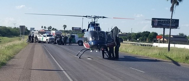 A helicopter emergency medical crew prepare to airlift an unresponsive Guatemalan woman for medical treatment. (Photo: U.S. Border Patrol/Rio Grande Valley Sector)