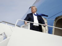 Donald Trump President Donald Trump boards Air Force One at Andrews Air Force Base, Tuesday, Oct. 2, 2018, in Andrews Air Force Base, Md.