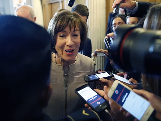 Sen. Susan Collins, R-Maine, talks with reporters after speaking on the Senate floor, on C