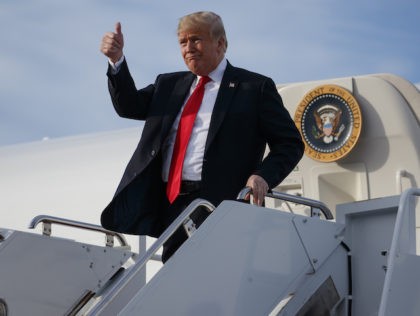 President Donald Trump arrives at Erie International Airport for a campaign rally at Erie Insurance Arena, Wednesday, Oct. 10, 2018, in Erie, Pa.
