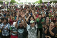 A group of Central American migrants gather in the central park of Ciudad Hidlago, Mexico, Saturday, Oct. 20, 2018. Mexican authorities for a second straight day refused mass entry to a caravan of Central American migrants held up at the border with Guatemala, but began accepting small groups for asylum …