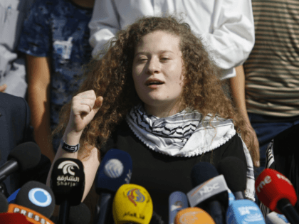 Ahed Tamimi speaks during a press conference on the outskirts of the West Bank village of