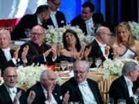 Al Smith Dinner Keynote speaker Ambassador to the United Nations Nikki Haley, center, shares a light moment as she attends the 73rd Annual Alfred E. Smith Memorial Foundation Dinner Thursday, Oct. 18, 2018, in New York. Left center is Archbishop of New York Cardinal Timothy Dolan, and right center is Michael Haley, husband …