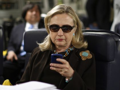 Banned Hillary Clinton sunglasses phone photo (Kevin Lamarque / Associated Press)