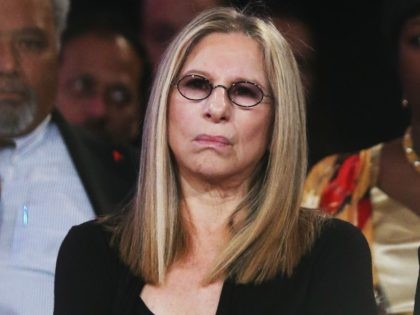 NEW YORK, NY - SEPTEMBER 25: Singer Barbra Streisand listens as Egyptian President Mohamed