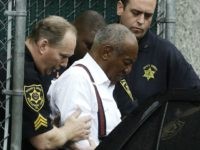 Bill Cosby departs after his sentencing hearing at the Montgomery County Courthouse, Tuesday, Sept. 25, 2018, in Norristown, Pa. Cosby left in handcuffs to begin serving a three-to-10 year prison sentence for sexual assault. (AP Photo/Matt Slocum)