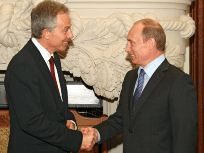 Russian Prime Minister Vladimir Putin (R) shakes hands with former Prime Minister of Britain Tony Blair in Moscow on June 16, 2008. Putin and Blair met amid the continuing investors row between in the joint British-Russian oil company TNK-BP. AFP PHOTO / RIA NOVOSTI / POOL / SERGEY SUBBOTIN (Photo …