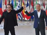 Bono and Donald Tusk Irish rock band U2 singer Bono (L) poses with European Council President Donald Tusk upon his arrival at the European Council in Brussels on October 10, 2018. - Bono, the co-founder of ONE, a global campaign and advocacy organisation committed to ending extreme poverty, is in Brussels to discuss African …