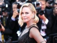Charlizenew1 CANNES, FRANCE - MAY 23: Actor Charlize Theron attends the 70th Anniversary of the 70th annual Cannes Film Festival at Palais des Festivals on May 23, 2017 in Cannes, France. (Photo by Chris Jackson/Getty Images)