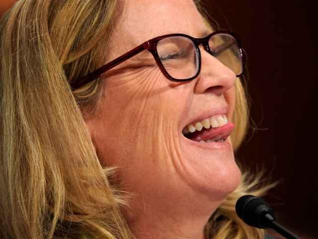 Christine Blasey Ford sticks out tongue