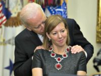Creepy Joe Biden Vice President Joe Biden talks with Stephanie Carter, wife of incoming Defense Secretary Ash Carter, during Carter's swearing in ceremony on Tuesday.