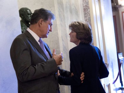 WASHINGTON, DC - AUGUST 23: Sen. Lisa Murkowski (R-AK) (R) talks with Sen. Joe Manchin (D-