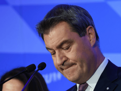 Bavaria's State Premier Markus Soeder speaks to supporters after first exit polls wer