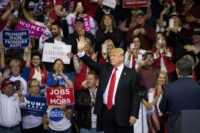 HOUSTON, TX - OCTOBER 22: U.S. President Donald Trump is brought on stage by Sen. Ted Cruz (R-TX) during a rally on October 22, 2018 at the Toyota Center in Houston, Texas. Cruz, the incumbent, is seeking Senate re-election in a high-profile race against Democratic challenger Beto O'Rourke. (Photo by …