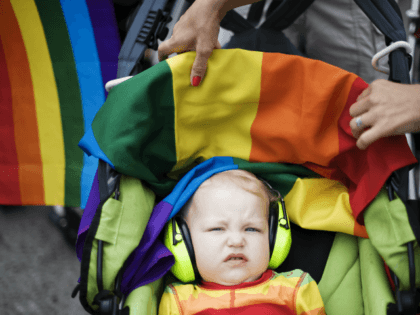 A child wearing ear protection gear attends the HBTQ festival 'Stockholm Pride' parade on August 6, 2011 in central Stockholm. AFP PHOTO / JONATHAN NACKSTRAND (Photo credit should read JONATHAN NACKSTRAND/AFP/Getty Images)