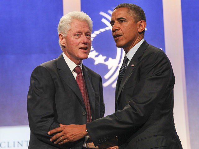 NEW YORK - SEPTEMBER 24: Former U.S. President Bill Clinton (L) greets U.S. President Barack Obama on stage during the annual Clinton Global Initiative (CGI) meeting on September 24, 2013 in New York City. Timed to coincide with the United Nations General Assembly, CGI brings together heads of state, CEOs, …