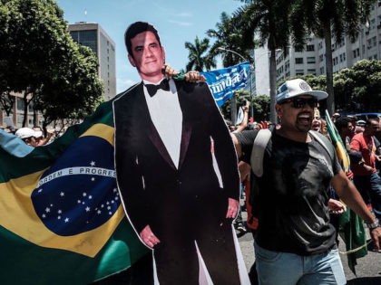 A protester carries a life-size image of Brazilian Federal Judge Sergio Moro, who conducts the Lava Jato (Car wash) operation, the biggest corruption investigation in Brazil's history, during a public servants' demonstration against austerity measures in front of the Rio de Janeiro state Assembly (ALERJ), in Rio de Janeiro, Brazil, …
