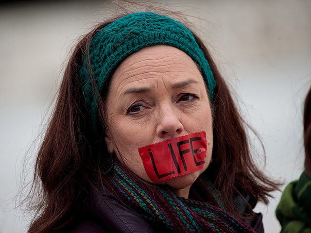 WASHINGTON, DC - JANUARY 27: An anti-abortion advocate rallies outside of the Supreme Court during the March for Life, January 27, 2017 in Washington, DC. This year marks the 44th anniversary of the landmark Roe v. Wade Supreme Court case, which established a woman's constitutional right to an abortion. (Photo â¦