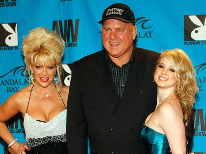 LAS VEGAS - JANUARY 10: (L-R) Air Force Amy, Bunny Ranch owner Dennis Hof and adult film actress Sunny Lane arrive at the 26th annual Adult Video News Awards Show at the Mandalay Bay Events Center January 10, 2009 in Las Vegas, Nevada. (Photo by Ethan Miller/Getty Images)