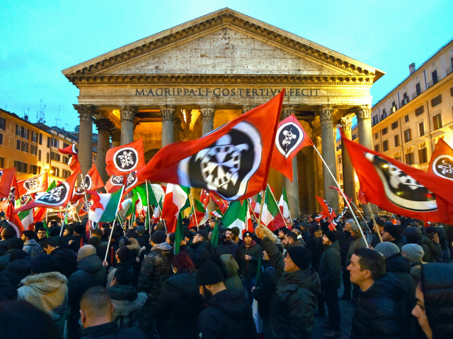 Activists of Casapound, a far right movement turned political party, wave flags during an