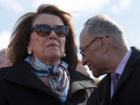 US-POLITICS-GUNS-SCHOOLS-PROTEST House Minority Leader Nancy Pelosi (L), D-California, and Senate Minority Leader Chuck Schumer (R), D-New York, speak to students from DC, Maryland and Virginia during a rally in their Solidarity Walk-Out to urge Republican leaders in Congress "to allow votes on gun violence prevention legislation" on Capitol Hill in Washington, …