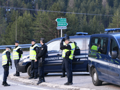 French gendarmes control the entrance to the valley of Nevache on April 23, 2018 near Bria