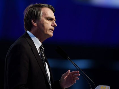 Jair Bolsonaro, Brazilian presidential candidate for the Social Liberal Party, attends a m
