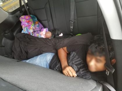 Laredo Sector Border Patrol agents find three illegal aliens hiding in a Chevy Suburban. (