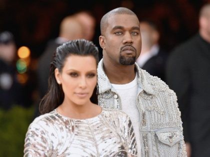 NEW YORK, NY - MAY 02: Kim Kardashian (L) and Kanye West attend the 'Manus x Machina: Fashion In An Age Of Technology' Costume Institute Gala at Metropolitan Museum of Art on May 2, 2016 in New York City. (Photo by Mike Coppola/Getty Images for People.com)
