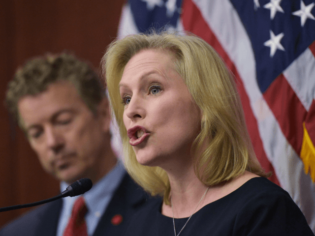 Kirsten Gillibrand, D-NY, speaks during a press conference with Senator Rand Paul , R-KY, to announce a new medical marijuana bill at the US Capitol on March 10, 2015 in Washington, DC. The Compassionate Access, Research Expansion and Respect States (CARERS) Act would reclassify marijuana from a Schedule I to …