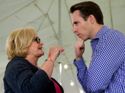 FILE - In this Aug. 17, 2017, file photo, Democratic Sen. Claire McCaskill, left, talks with Republican Missouri Attorney General Josh Hawley during the Governor's Ham Breakfast at the Missouri State Fair in Sedalia, Mo. Hawley announced in a video to be released Tuesday that he will run for the …