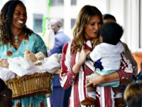 Melania in Africa First lady Melania Trump holds a baby as she visits Greater Accra Regional Hospital in Accra, Ghana, Tuesday, Oct. 2, 2018. The first lady is visiting Africa on her first big solo international trip, aiming to make child well-being the focus of a five-day, four-country tour.