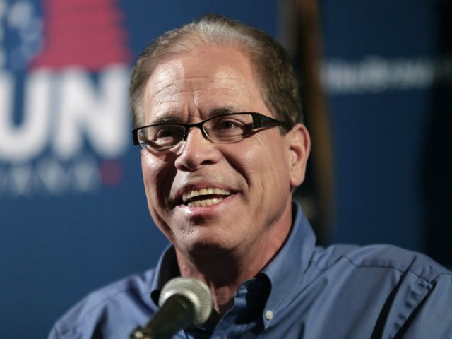 In this May 8, 2018 file photo Republican Senate candidate Mike Braun thanks supporters after winning the republican primary in Whitestown, Ind. Braun rails against foreign outsourcing on the campaign trail, even as his own company continues to sell its trademarked brand of auto accessories, many of which are made …