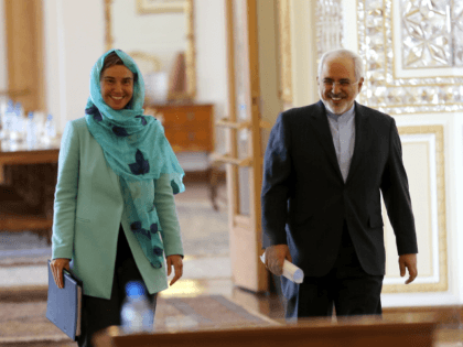 Iran's Foreign minister Mohammad Javad Zarif (R) and European Union High Representative for Foreign Affairs, Federica Mogherini arrive for a press conference after a meeting on April 16, 2016 in the capital Tehran. Mogherini arrived in Tehran on her first visit since a nuclear deal between Iran and world powers …