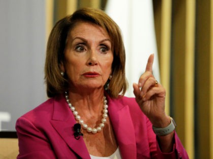 House Minority Leader Nancy Pelosi gestures while speaking at the Public Policy Institute