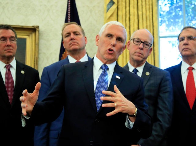 Vice President Mike Pence speaks following a ceremony signing the "America's Water Infrastructure Act of 2018" into law in the Oval Office at the White House in Washington, Tuesday, Oct. 23, 2018.