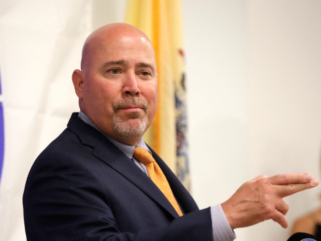 U.S. Rep. Tom MacArthur, R-N.J., speaks about the opioid epidemic during a talk at the Express Scripts mail-in pharmacy, Tuesday, July 10, 2018, in Florence, N.J. (AP Photo/Julio Cortez)