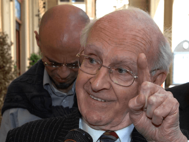 Retired French professor Robert Faurisson, with pin-striped suit, gestures as he speaks to journalists about Nazis during World War II, outside the University of Teramo campus in Teramo, central Italy, Friday May 18, 2007. The university closed one of its campuses for the day Friday, to prevent a planned lecture …