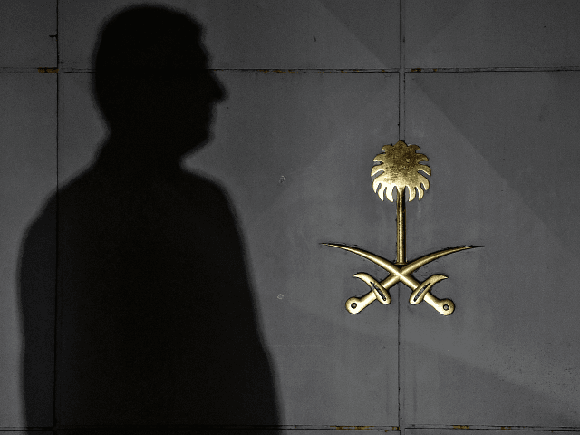A security member of the consulate waits in front of …