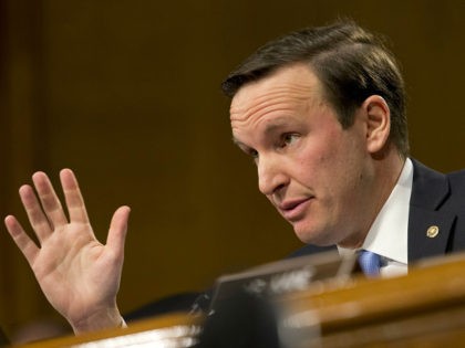 Sen. Chris Murphy, D-Conn., poses a question to Secretary of State-designate Rex Tillerson during testimony before the Senate Foreign Relations Committee on Capitol Hill in Washington, Wednesday, Jan. 11, 2017, (AP Photo/Steve Helber)