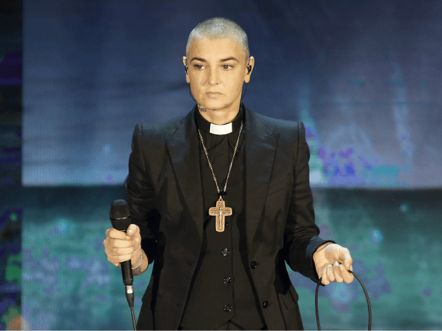 FILE - In this Oct. 5, 2014 file photo, Irish singer Sinead O'Connor performs during the Italian State RAI TV program "Che Tempo che Fa", in Milan, Italy. 51-year old O'Connor has announced Friday Oct. 26, 2018, that she has converted to Islam and said she has changed her name …