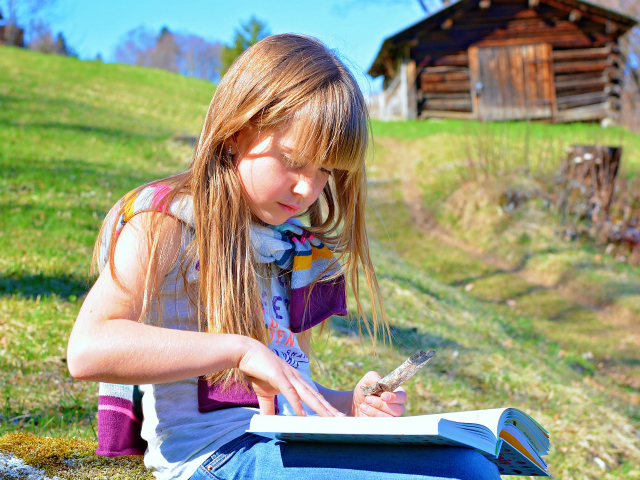Slovene child reading a faerie tale