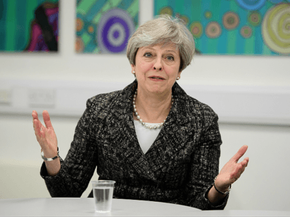 MAIDENHEAD, ENGLAND - APRIL 21: Prime Minster Theresa May talks to students and first-time